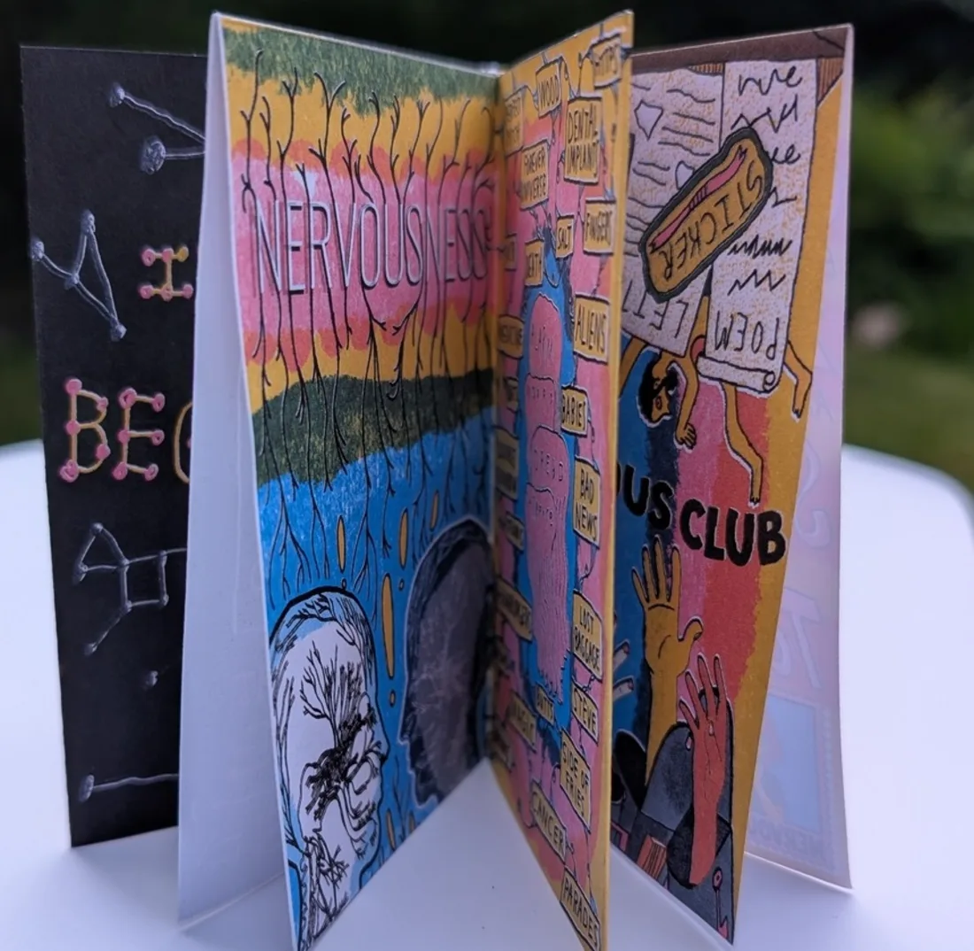 The zine standing open
